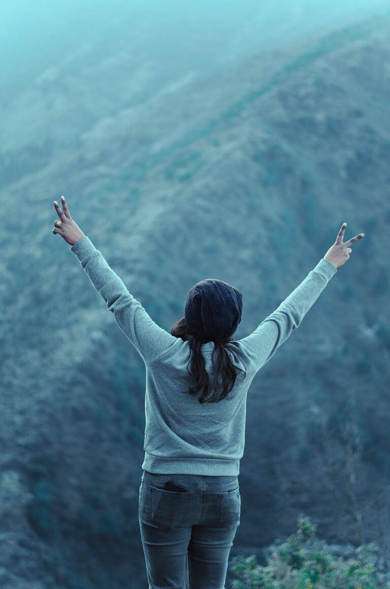 Woman standing on a mountain - Do Women Watch Porn