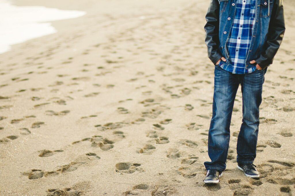 guy walking on beach protect yourself from porn