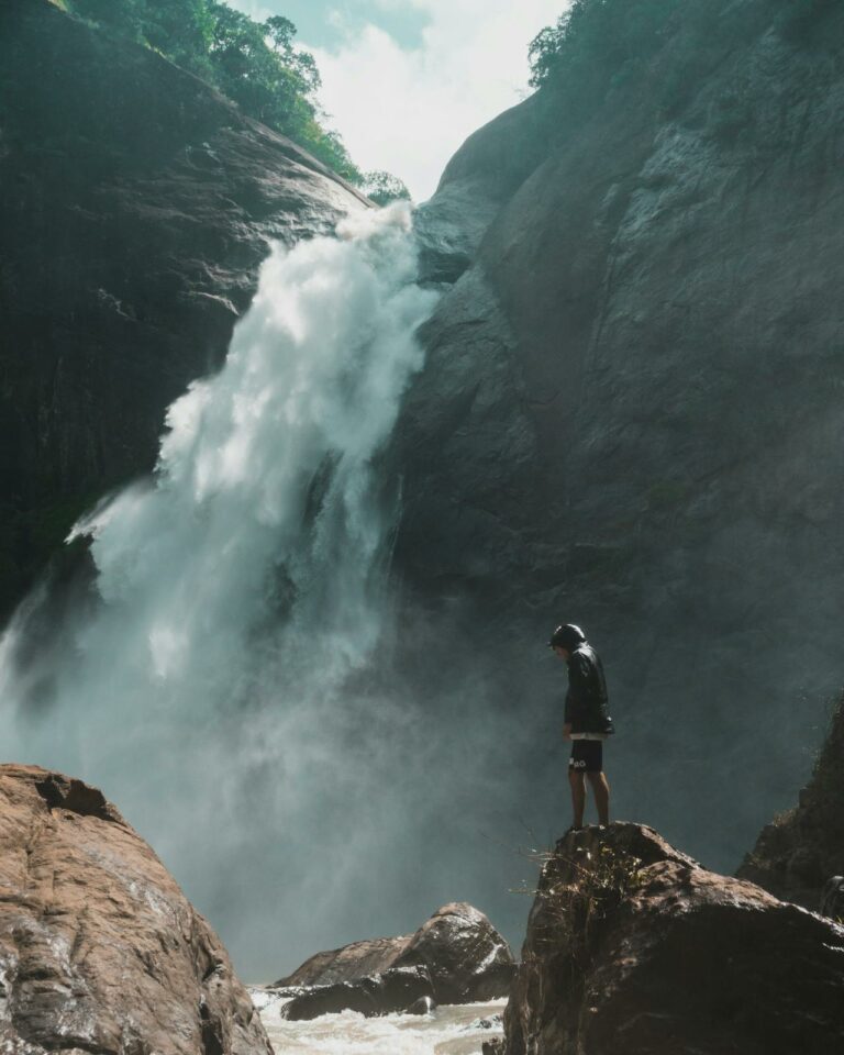 Man standing in front of waterfall, Faith and Sex: a how to guide for porn recovery and real change